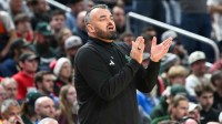 South Florida Bulls head coach Bryan Hodgson looks on during the second half against the Louisville Cardinals during a first round game of the men's 2026 NCAA Tournament at Keybank Center.