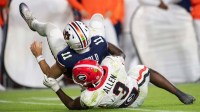 Georgia Bulldogs inside linebacker CJ Allen (3) sacks Auburn Tigers quarterback Jackson Arnold (11) as Auburn Tigers take on Georgia Bulldogs at Jordan-Hare Stadium.