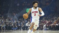 Detroit Pistons guard Cade Cunningham (2) dribbles the ball in the first quarter against the Cleveland Cavaliers at Rocket Arena.