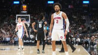 Detroit Pistons guard Cade Cunningham (2) reacts after drawing a foul while scoring a three point basket during the second half against the San Antonio Spurs at Frost Bank Center.