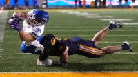 Southern Methodist Mustangs tight end Matthew Hibner (88) scores a touchdown against California Golden Bears linebacker Cade Uluave (0) during the third quarter at California Memorial Stadium.
