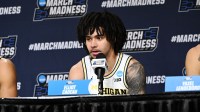 Michigan Wolverines guard Elliot Cadeau (3) speak with media after the game against the Saint Louis Billikens during a second round game of the men's 2026 NCAA Tournament at Keybank Center.
