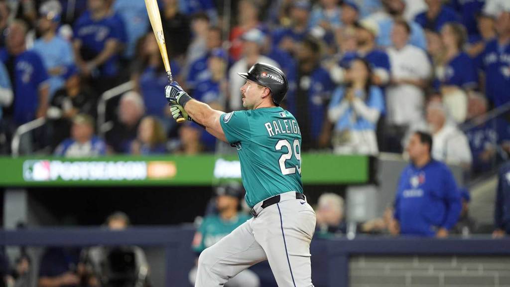 Seattle Mariners catcher Cal Raleigh (29) hits a solo home run against the Toronto Blue Jays in the sixth inning during game one of the ALCS round for the 2025 MLB playoffs at Rogers Centre.