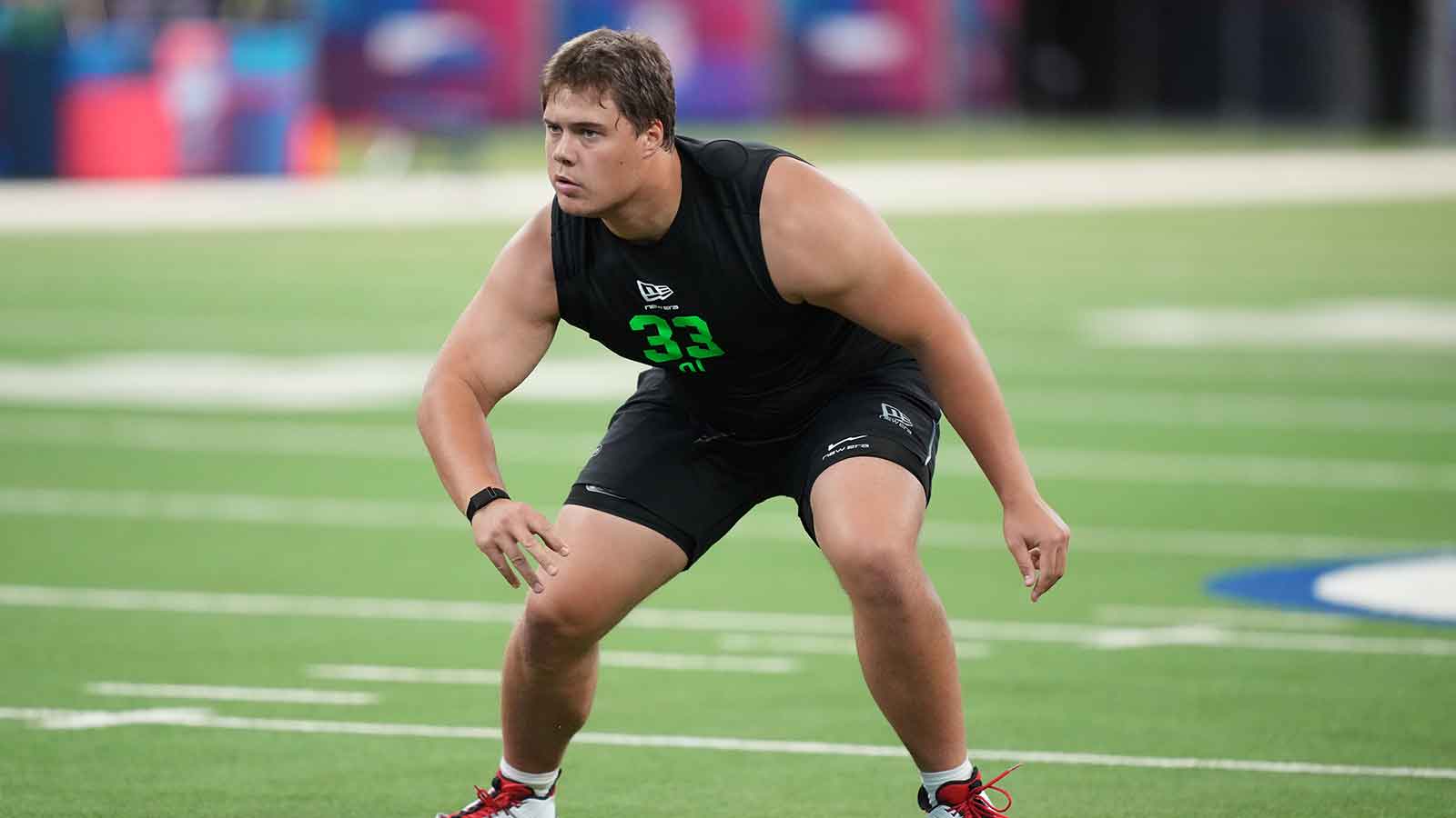 Utah offensive lineman Caleb Lomu (OL33) during the NFL Scouting Combine at Lucas Oil Stadium.