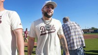 ASU football star Cam Skattebo plays in the second annual alumni and celebrity softball game to kick off the ASU baseball season at Phoenix Municipal Stadium on Feb. 1, 2026.