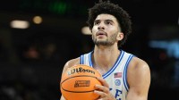 Duke Blue Devils forward Cameron Boozer (12) shoots a free throw against the Siena Saints in the first half during a first round game of the men's 2026 NCAA Tournament at Bon Secours Wellness Arena.