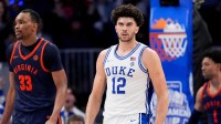 Duke Blue Devils forward Cameron Boozer (12) celebrates after a play against the Virginia Cavaliers during the men's ACC Conference Tournament Championship at Spectrum Center.
