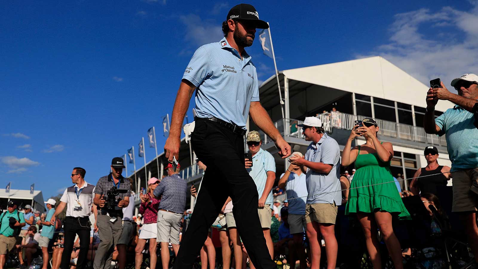Cameron Young walks to the tee box on the 17th hole during the fourth round of The Players Championship PGA golf tournament at TPC Sawgrass, Sunday, March 15, 2026, in Ponte Vedra Beach, Fla. Cameron Young won the tournament at 13 under par, one stroke over Matt Fitzpatrick