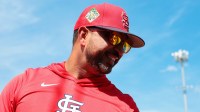St. Louis Cardinals manager Oliver Marmol (37) looks on from the dugout before the game against the New York Mets at Roger Dean Chevrolet Stadium.