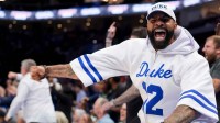 Former Duke Blue Devils player Carlos Boozer reacts after a play during the men's ACC Conference Tournament Championship at Spectrum Center.