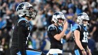 Carolina Panthers quarterback Bryce Young (9) reacts in the fourth quarter in an NFC Wild Card Round game at Bank of America Stadium.