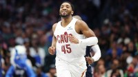 Cleveland Cavaliers guard Donovan Mitchell (45) reacts after scoring during the second half against the Dallas Mavericks at American Airlines Center.