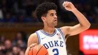 Duke Blue Devils guard Cayden Boozer (2) makes a call during the second half against the Syracuse Orange at Cameron Indoor Stadium.