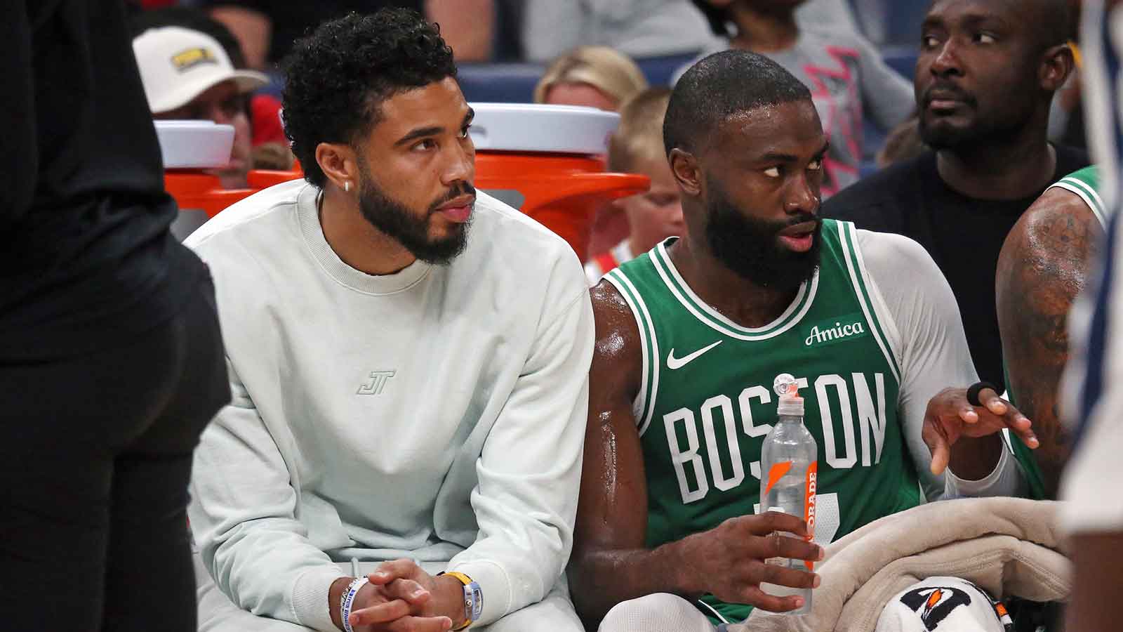 Celtics forward Jayson Tatum (0) and guard Jaylen Brown (7) look on from the bench during the second quarter against the Memphis Grizzlies at FedExForum