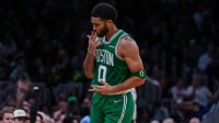 Celtics forward Jayson Tatum celebrates 3