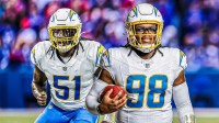 Kayden McDonald and Malachi Lawrence in Chargers uniforms and an NFL draft background.