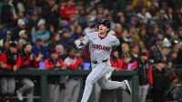 Cleveland Guardians right fielder Chase DeLauter (24) scores a run against the Seattle Mariners during the seventh inning at T-Mobile Park.