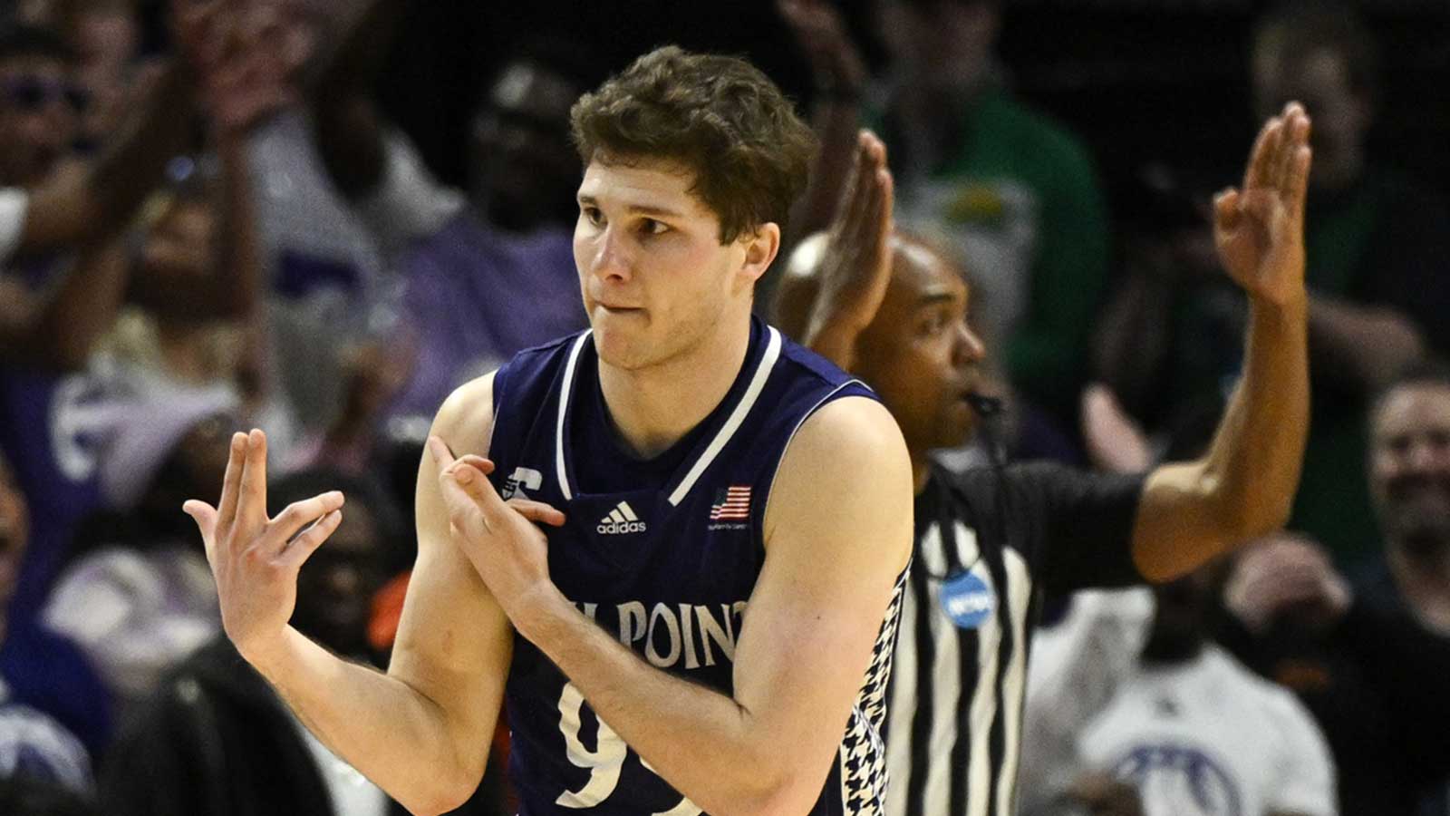 High Point Panthers guard Chase Johnston (99) reacts during the second half of a first round game of the men's 2026 NCAA Tournament against the Wisconsin Badgers at Moda Center.