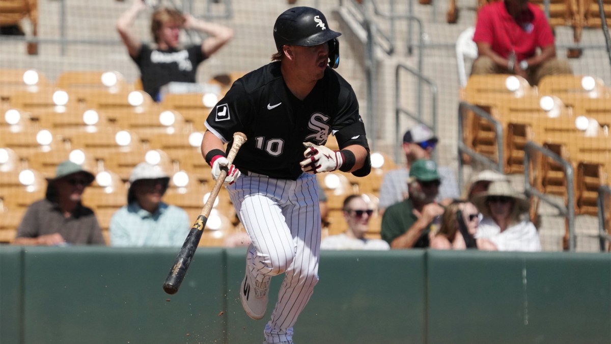 Chicago White Sox shortstop Chase Meidroth (10) hits a single against the Athletics in the first inning at Camelback Ranch-Glendale