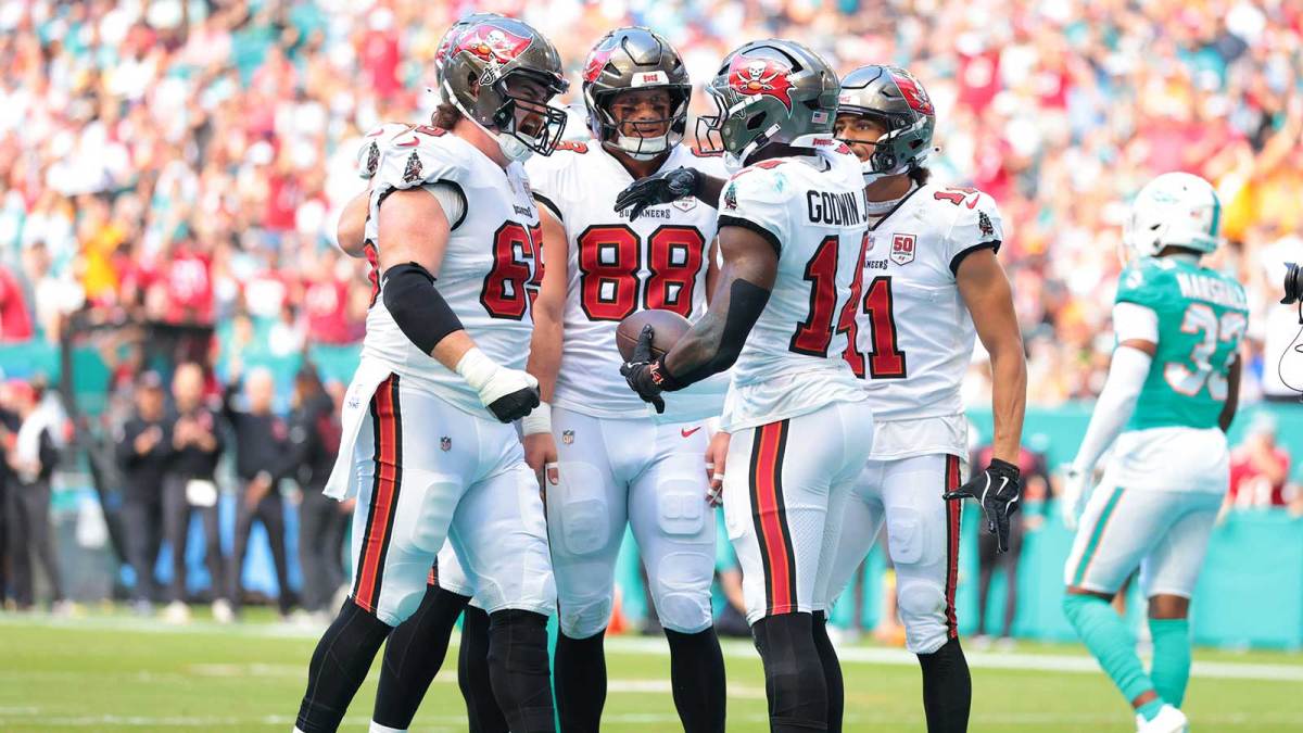 Tampa Bay Buccaneers wide receiver Chris Godwin Jr. (14) celebrates a touchdown with teammates during the first quarter against the Miami Dolphins at Hard Rock Stadium.