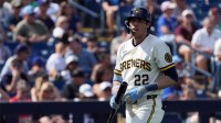 Milwaukee Brewers left fielder Christian Yelich (22) strikes out against the Los Angeles Dodgers in the third inning at American Family Fields of Phoenix.