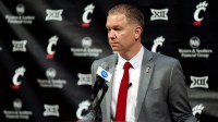 Cincinnati head coach Jerrod Calhoun speaks during a press conference announcing him as the head men's basketball coach at Fifth Third Arena in Cincinnati on Wednesday, March 25, 2026.