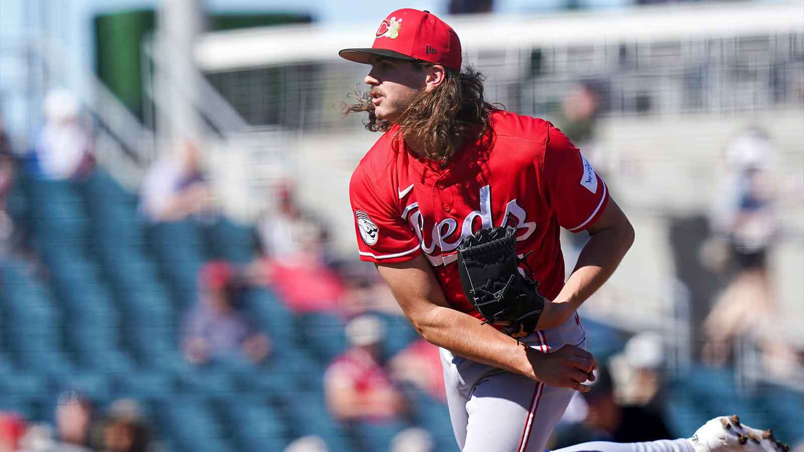 Cincinnati Reds pitcher Rhett Lowder (25) delivers a pitch in the third inning of a Cactus League game between the Cincinnati Reds and Cleveland Guardians, Saturday, Feb. 21, 2026, at Goodyear Ballpark in Goodyear, Ariz.