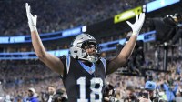 Carolina Panthers wide receiver Jalen Coker (18) celebrates his score with fans during the second half of the NFC Wild Card Round game between the Carolina Panthers and the Los Angeles Rams at Bank of America Stadium