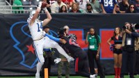 ndianapolis Colts wide receiver Alec Pierce (14) is pushed out of bounds by Houston Texans cornerback Ja'marcus Ingram (42) during the second half at NRG Stadium.