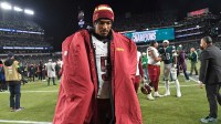 Washington Commanders quarterback Jayden Daniels (5) walks off the field after loss to the Philadelphia Eagles in the NFC Championship game at Lincoln Financial Field.