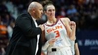 Connecticut Sun head coach Rachid Meziane talks with guard Marina Mabrey (3) from the sideline as they take on the Phoenix Mercury at Mohegan Sun Arena.