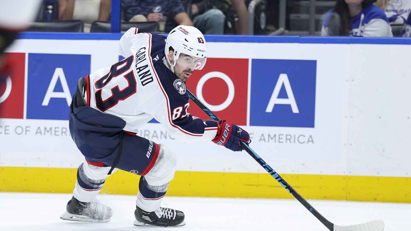 Columbus Blue Jackets right wing Conor Garland (83) controls the puck against the Tampa Bay Lightning in the third period at Benchmark International Arena.