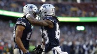 Dallas Cowboys wide receiver Jalen Tolbert (18) celebrates with Cowboys wide receiver CeeDee Lamb (88) after catching a touchdown pass against the Washington Commanders during the first quarter at FedExField