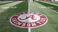 A view of the Alabama Crimson Tide logo on the field before the game between the Alabama Crimson Tide and the Georgia Bulldogs during the 2025 SEC Championship game at Mercedes-Benz Stadium. Mandatory Credit: Brett Davis-Imagn Images