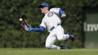 hicago Cubs center fielder Pete Crow-Armstrong (4) catches a fly ball hit by Milwaukee Brewers first baseman Andrew Vaughn during the fourth inning at Wrigley Field.
