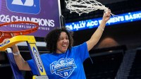 Mar 8, 2026; Duluth, GA, USA; Duke Blue Devils head coach Kara Lawson cuts down the net after Duke defeated the Louisville Cardinals at Gas South Arena. Mandatory Credit: Dale Zanine-Imagn Images
