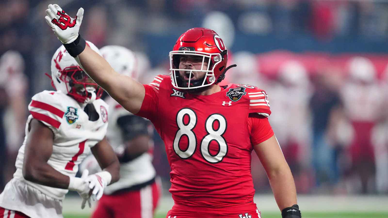 Utah Utes tight end Dallen Bentley (88) gestures after a first down against the Nebraska Cornhuskers in the first half during the SRS Distribution Las Vegas Bowl at Allegiant Stadium.