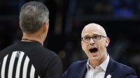UConn Huskies head coach Dan Hurley talks to a referee against the Duke Blue Devils in the first half during an Elite Eight game of the East Regional of the men's 2026 NCAA Tournament at Capital One Arena.