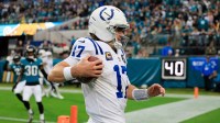 Indianapolis Colts quarterback Daniel Jones (17) is forced out of bounds on a keeper during the first quarter of an NFL football game at EverBank Stadium, Sunday, Dec. 7, 2025, in Jacksonville, Fla. The Jaguars defeated the Colts 36-19.
