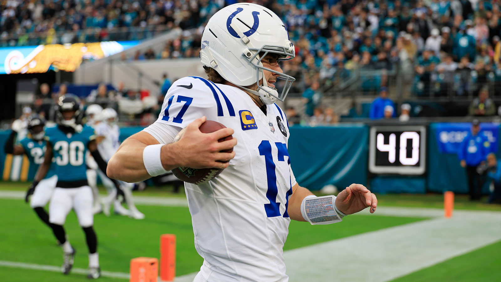 Indianapolis Colts quarterback Daniel Jones (17) is forced out of bounds on a keeper during the first quarter of an NFL football game at EverBank Stadium, Sunday, Dec. 7, 2025, in Jacksonville, Fla. The Jaguars defeated the Colts 36-19.
