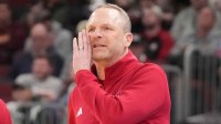 Indiana Hoosiers head coach Darian Devries shouts instructions to his team against the Northwestern Wildcats during the first half at United Center.