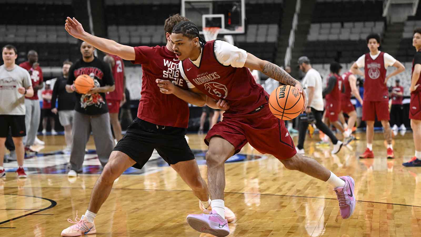 Arkansas Razorbacks guard Darius Acuff Jr. (5) dribbles the basketball during a practice session ahead of the west regional of the men's 2026 NCAA Tournament at SAP Center.