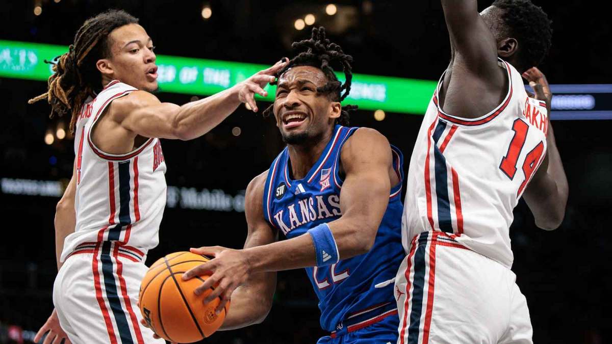 Kansas Jayhawks head coach Bill Self (center) in the huddle with his players against the Arizona State Sun Devils in the first half at Desert Financial Arena.