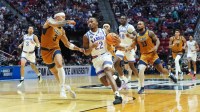 Kansas Jayhawks guard Darryn Peterson (22) controls the ball against California Baptist Lancers guard Jayden Jackson (3) in the first half during a first round game of the men's 2026 NCAA Tournament at Viejas Arena.