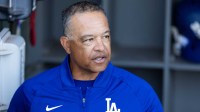 Los Angeles Dodgers manager Dave Roberts against the Cincinnati Reds during a spring training game at Camelback Ranch-Glendale.