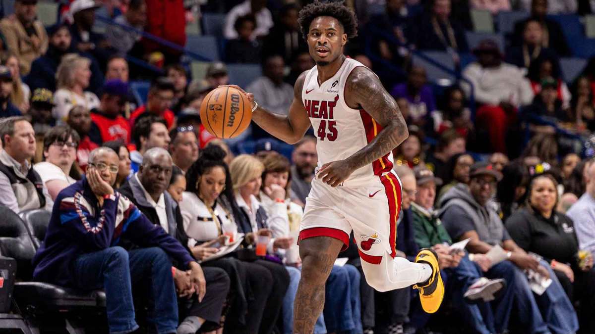 Miami Heat guard Davion Mitchell (45) brings the ball up court against the New Orleans Pelicans during the first half at Smoothie King Center.