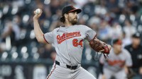 Baltimore Orioles starting pitcher Dean Kremer (64) delivers a pitch against the Chicago White Sox during the first inning at Rate Field.