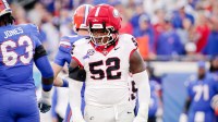 Georgia Bulldogs defensive lineman Christen Miller (52) reacts after making a tackle against the Florida Gators at EverBank Stadium.