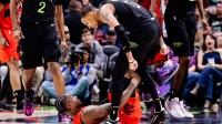 New Orleans Pelicans guard Dejounte Murray (5) leans over Toronto Raptors guard Jamal Shead (23) after making a three point basket during the second half at Smoothie King Center.