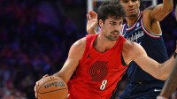 Portland Trail Blazers forward Deni Avdija (8) drives to the basket past Philadelphia 76ers forward Dominick Barlow (25) during the first half at Xfinity Mobile Arena.